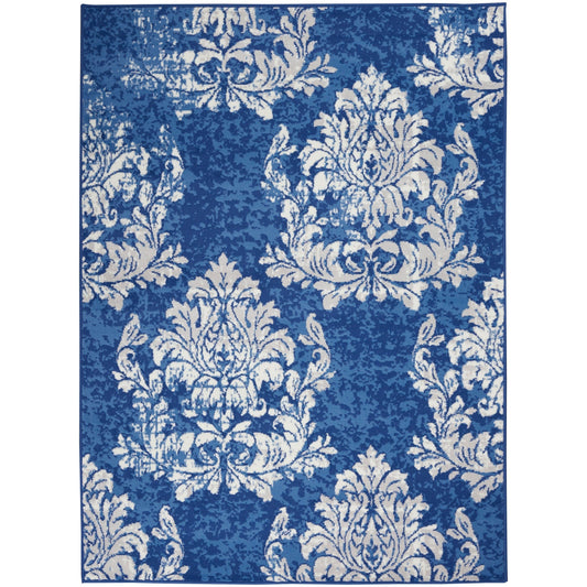 Tapis Nourison Whimsicle style campagne française, motif botanique, ivoire et marine