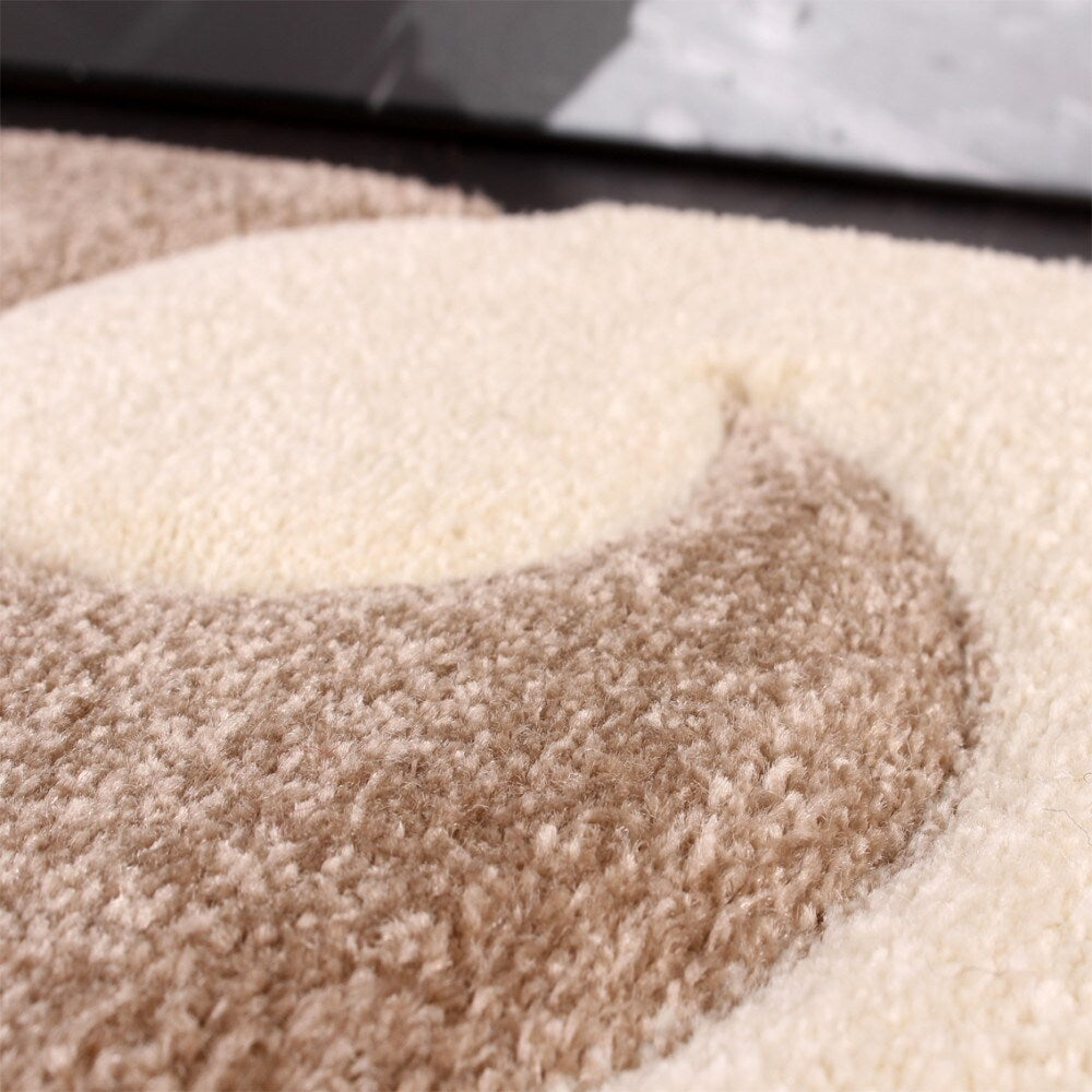 Tapis moderne à motif floral et découpe contour