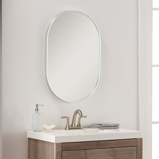 Miroir d'appoint ovale moderne en aluminium Livabliss Aranya en forme de pilule