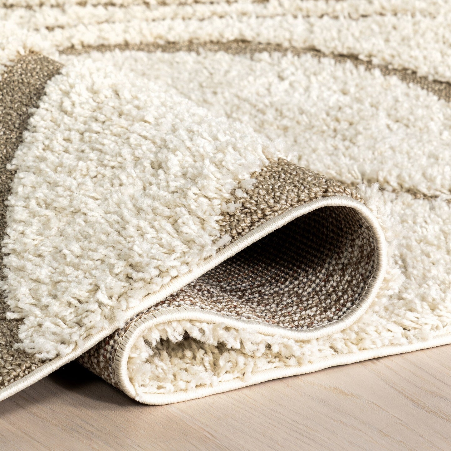 Tapis à poils longs Nuloom Krista contemporain à motifs tourbillonnants