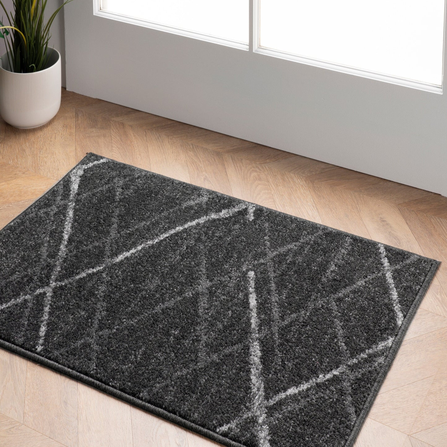 Tapis de sol abstrait moderne Nuloom Skylar
