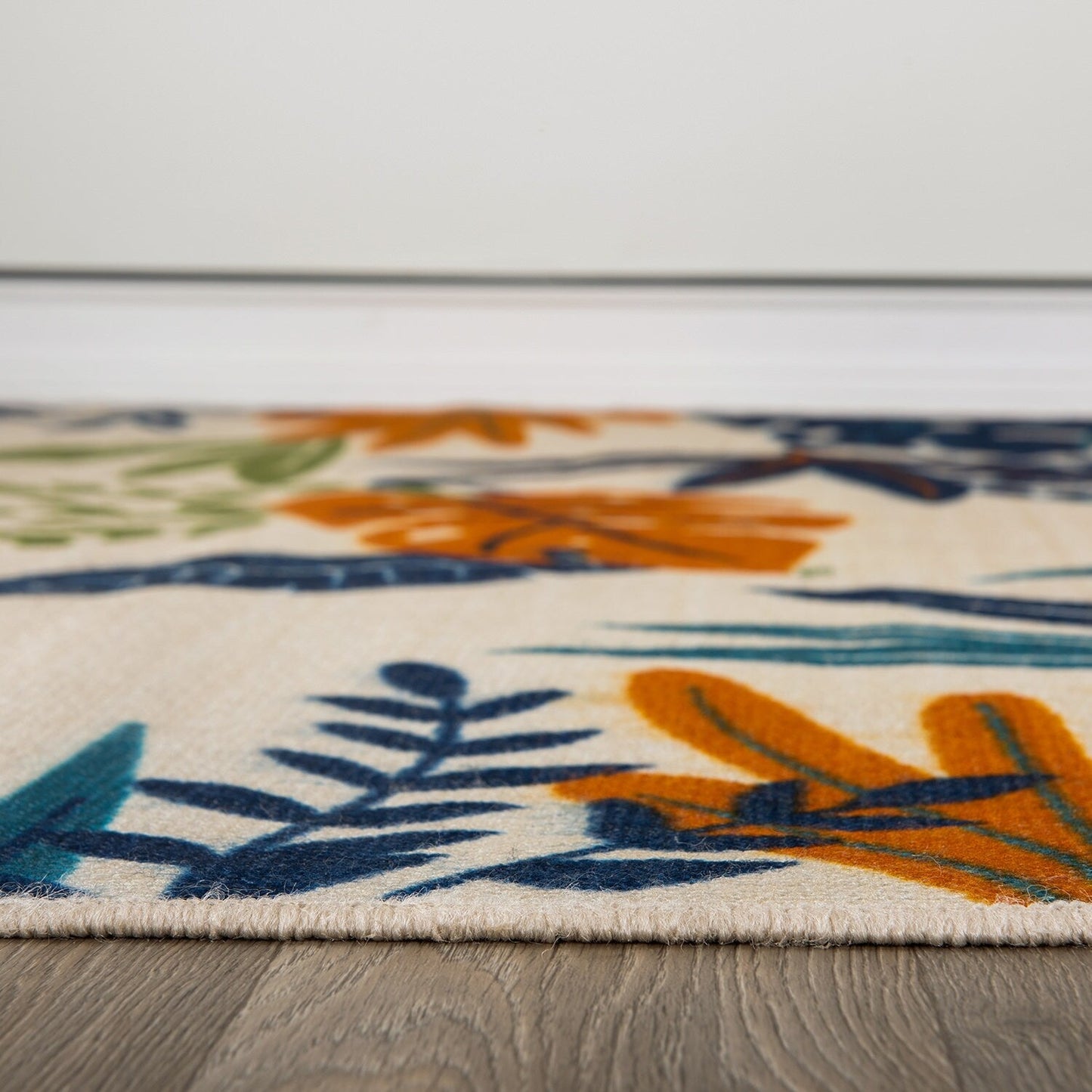 Tapis d'intérieur/extérieur contemporain à motif floral et feuilles