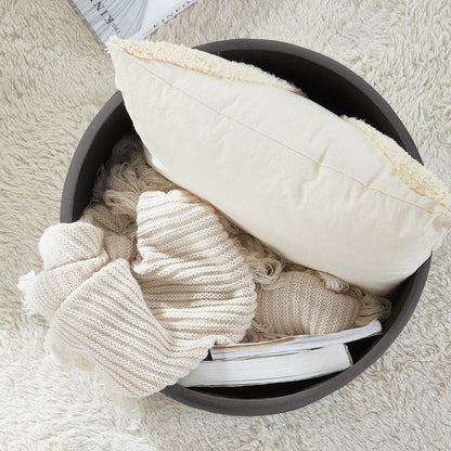 Pouf de rangement rond capitonné Donovan