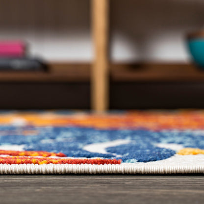 Tapis d'intérieur/extérieur JONATHAN Y Aydin à motifs de feuilles de palmier