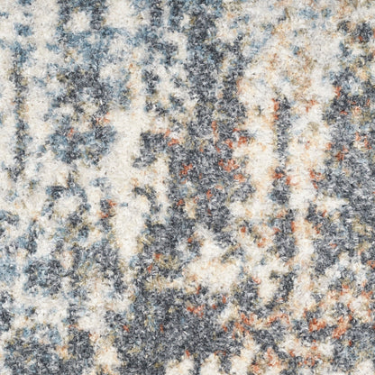 Tapis Nourison Astra lavable en machine à motifs abstraits