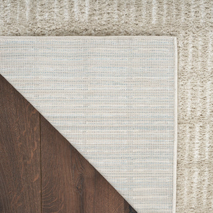 Tapis d'intérieur moderne et confortable Nourison à motifs abstraits