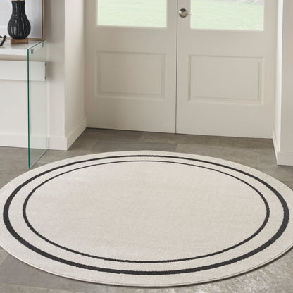 Tapis d'intérieur/extérieur uni Nourison Essentials