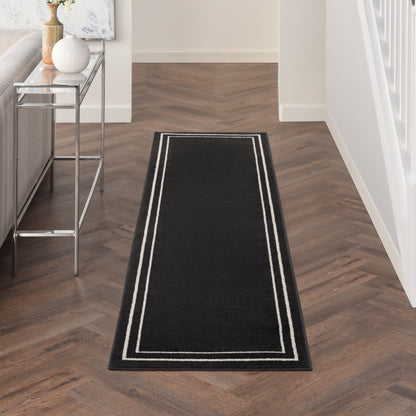 Tapis d'intérieur/extérieur uni Nourison Essentials
