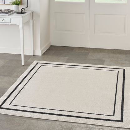 Tapis d'intérieur/extérieur uni Nourison Essentials