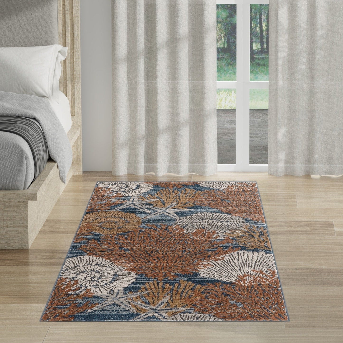 Tapis Nourison Pompéi, motif coquillages et coraux, idéal pour la plage côtière