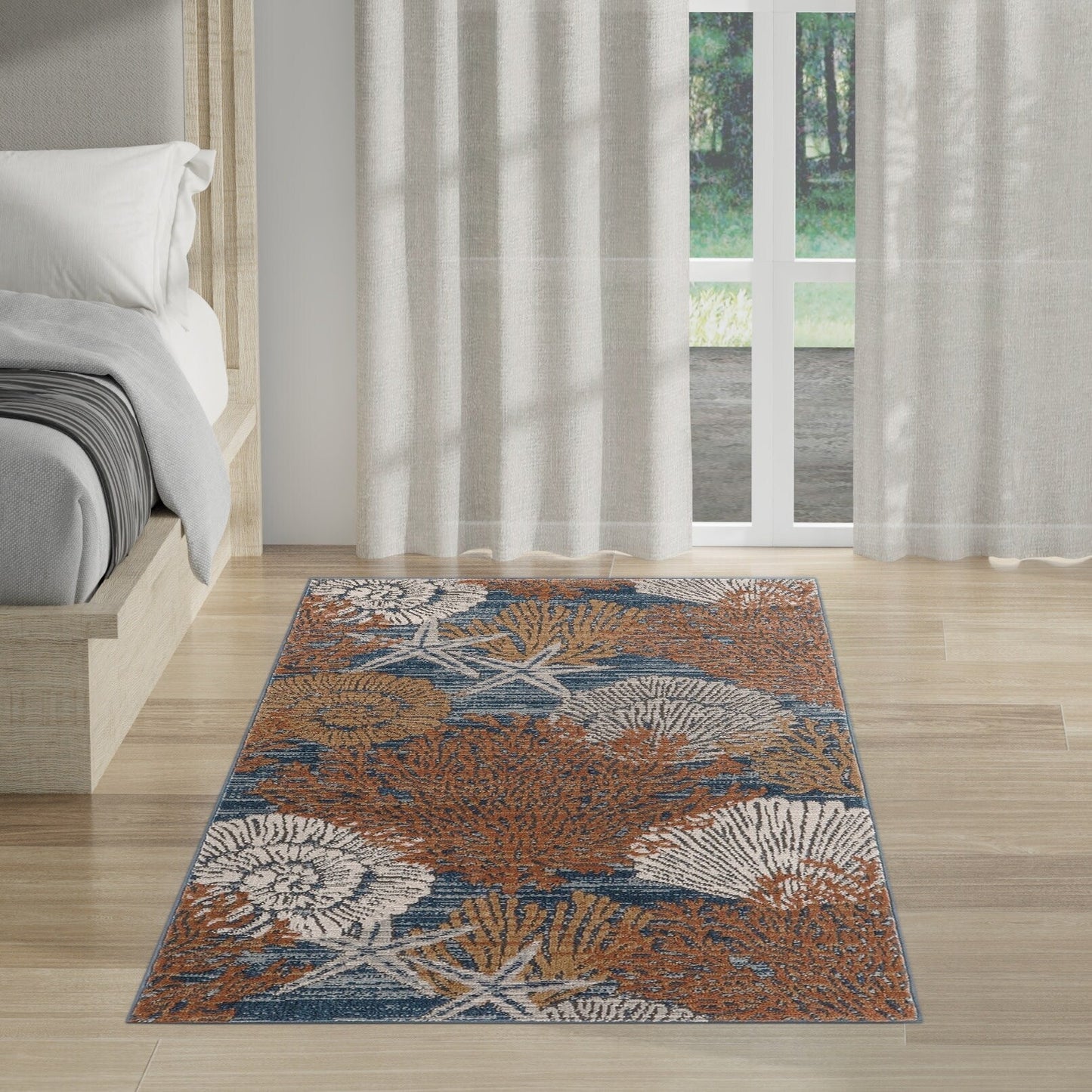 Tapis Nourison Pompéi, motif coquillages et coraux, idéal pour la plage côtière