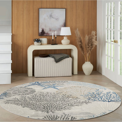 Tapis Nourison Pompéi, motif coquillages et coraux, idéal pour la plage côtière