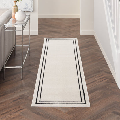 Tapis d'intérieur/extérieur uni Nourison Sandy
