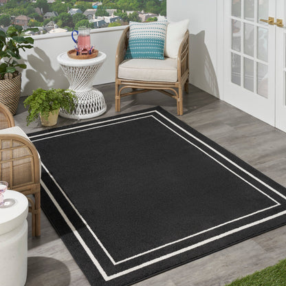 Tapis d'intérieur/extérieur uni Nourison Sandy