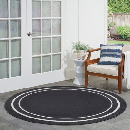 Tapis d'intérieur/extérieur uni Nourison Sandy