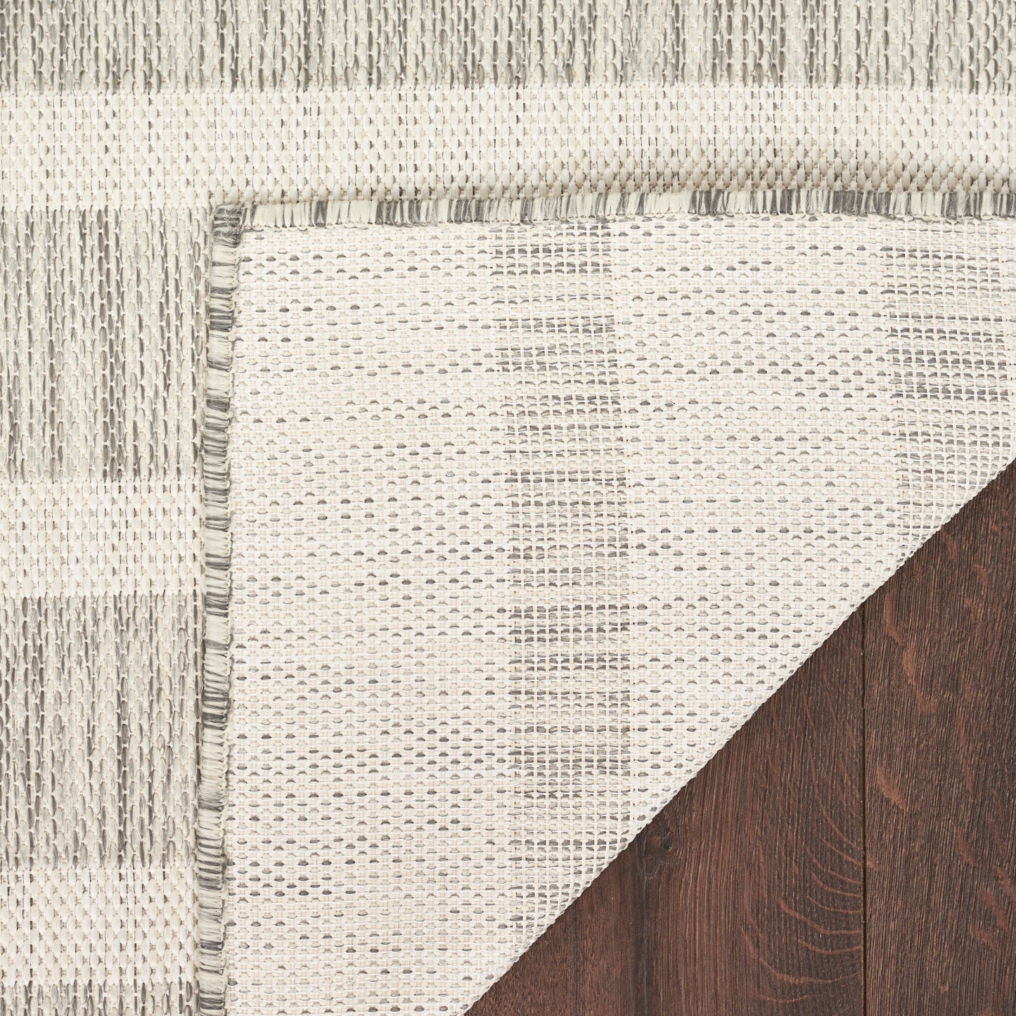 Tapis rayé d'intérieur/extérieur Nourison Selerno.