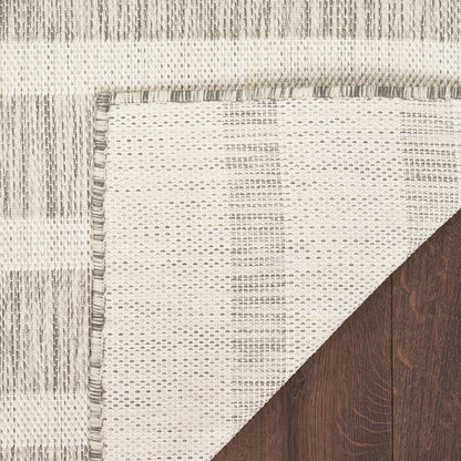 Tapis rayé d'intérieur/extérieur Nourison Selerno.