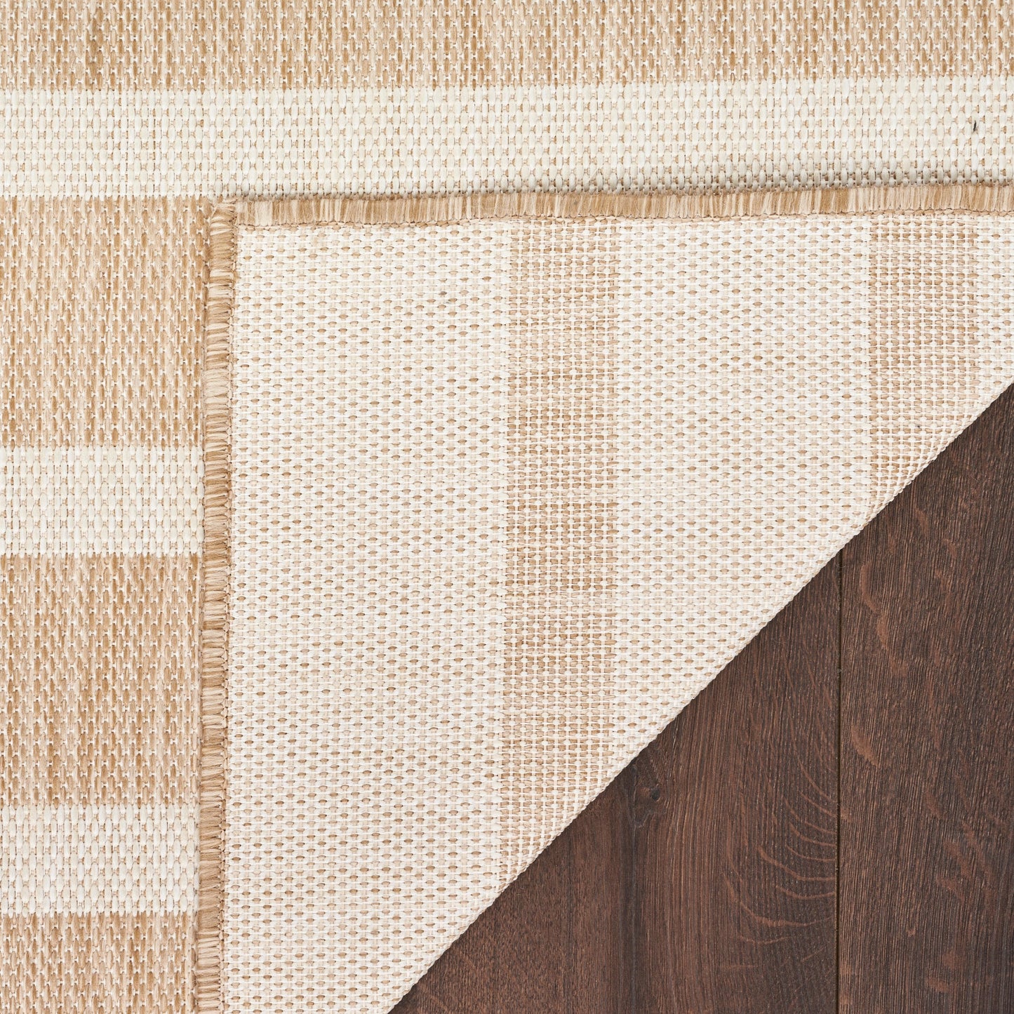 Tapis rayé d'intérieur/extérieur Nourison Selerno.