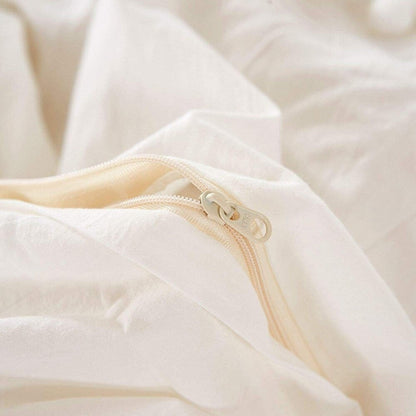 Parure de lit réversible en coton à pompons