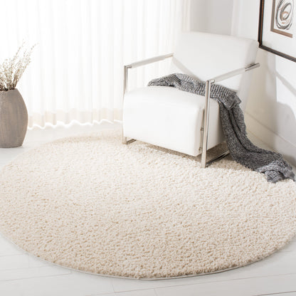 Tapis SAFAVIEH August Wilhelma Shag uni de 3 cm d'épaisseur