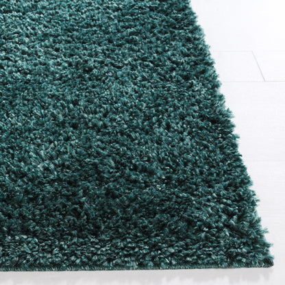 Tapis SAFAVIEH August Wilhelma Shag uni de 3 cm d'épaisseur