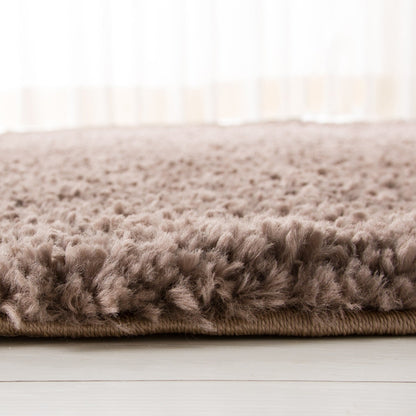 Tapis SAFAVIEH August Wilhelma Shag uni de 3 cm d'épaisseur