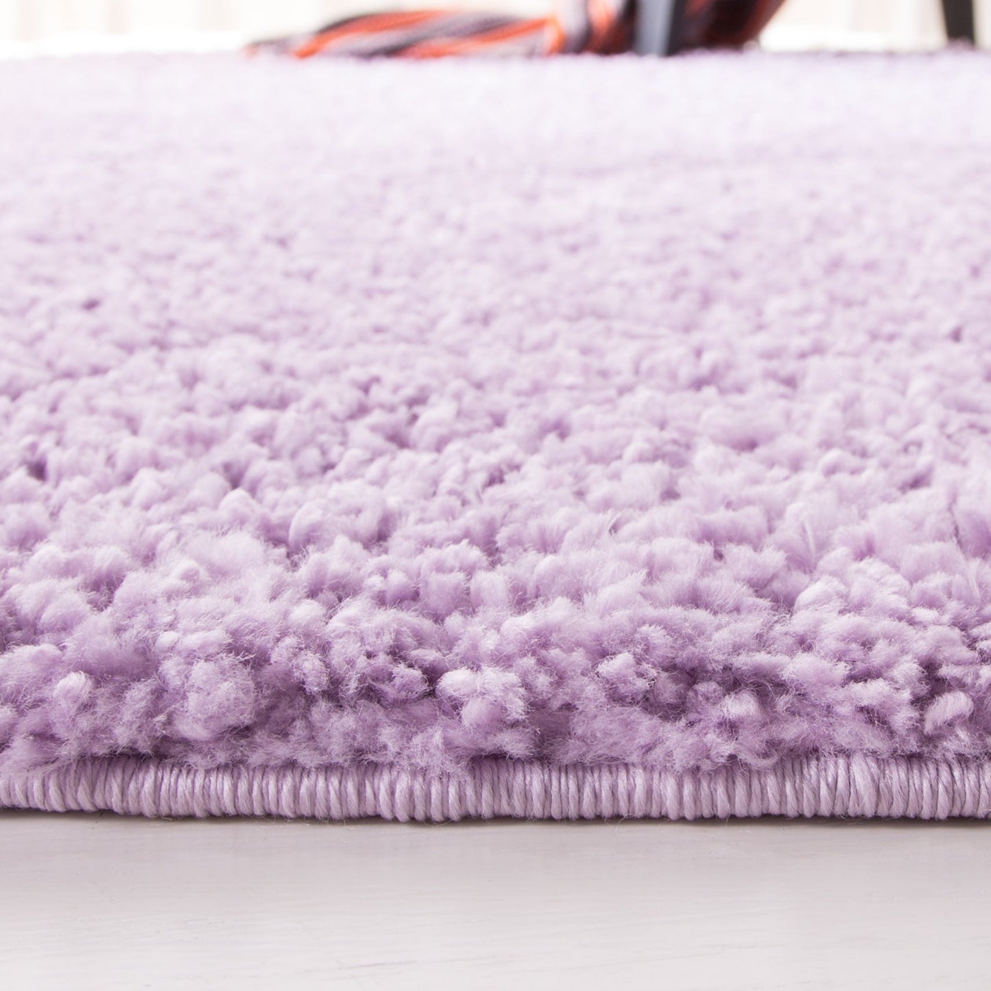 Tapis SAFAVIEH August Wilhelma Shag uni de 3 cm d'épaisseur