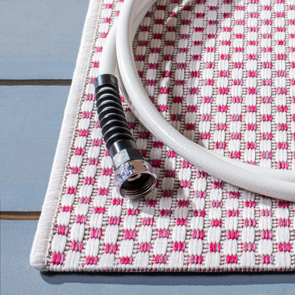 Tapis de patio/jardin imperméable SAFAVIEH Courtyard Begajeta pour intérieur/extérieur.