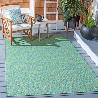 Tapis de patio/jardin imperméable SAFAVIEH Courtyard Begajeta pour intérieur/extérieur.