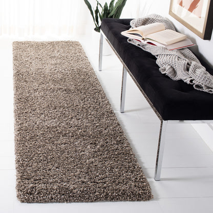 Tapis SAFAVIEH Evolution Shag Fransien uni de 4,6 cm d'épaisseur