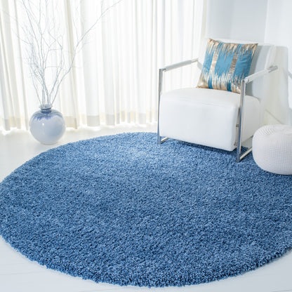 Tapis SAFAVIEH Evolution Shag Fransien uni de 4,6 cm d'épaisseur