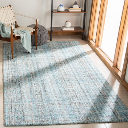 Tapis moderne en viscose SAFAVIEH fait main, motif abstrait corail
