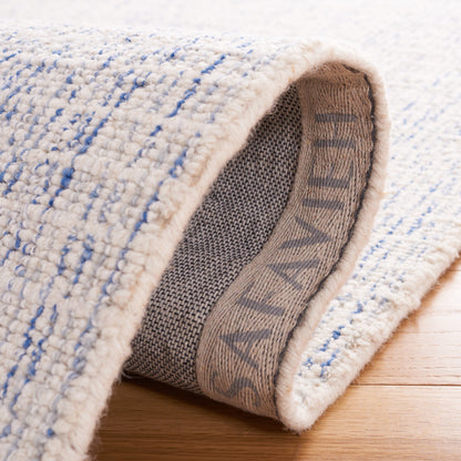 Tapis moderne en laine abstrait Maggy fait main SAFAVIEH