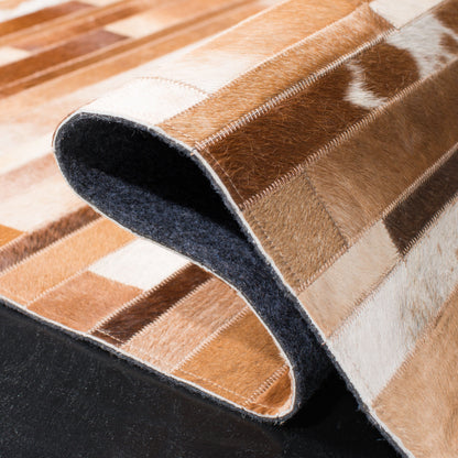 Tapis en cuir moderne SAFAVIEH fait main en atelier Tennille