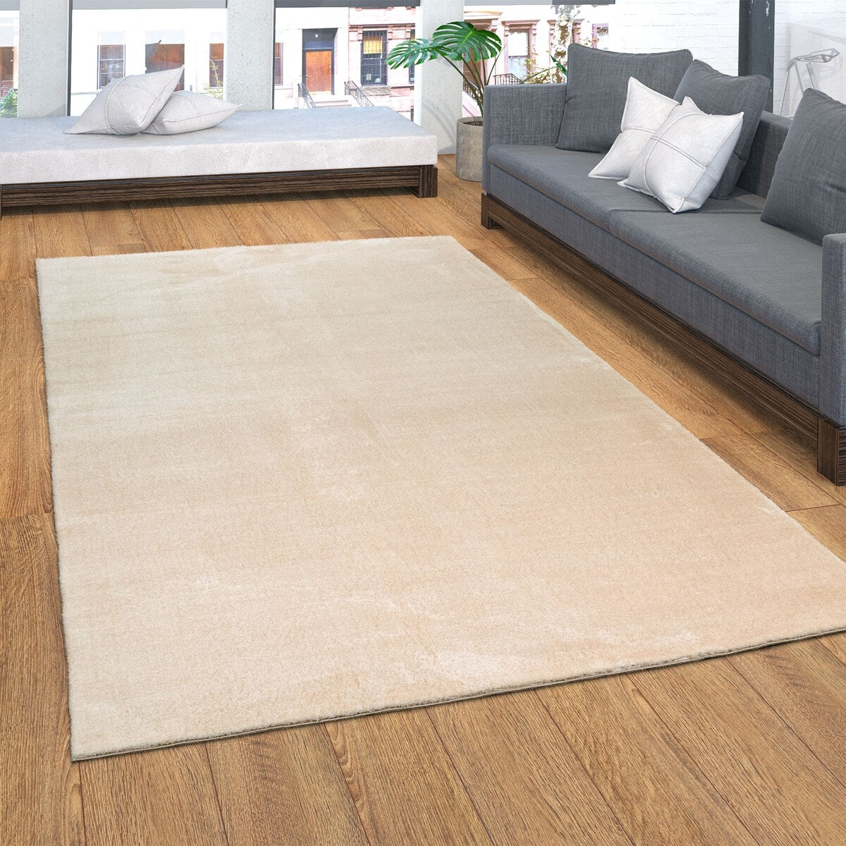 Tapis doux et lavable avec envers antidérapant, disponible en couleurs unies.