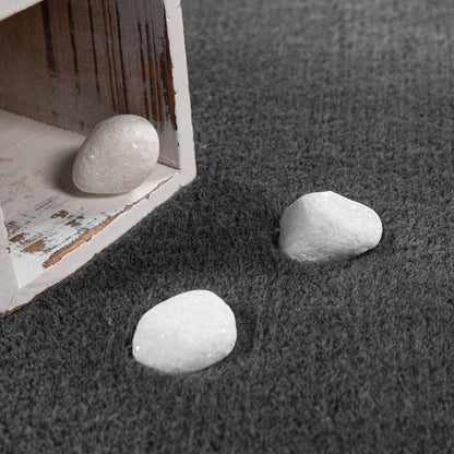 Tapis doux et lavable avec envers antidérapant, disponible en couleurs unies.