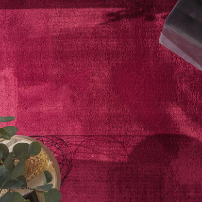 Tapis doux et lavable avec envers antidérapant, disponible en couleurs unies.