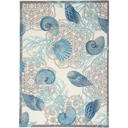 Tapis d'intérieur/extérieur Waverly Sun &amp; Shade Shore Thing Tropical Sea Shell Floral