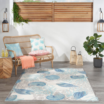 Tapis d'intérieur/extérieur Waverly Sun &amp; Shade Shore Thing Tropical Sea Shell Floral