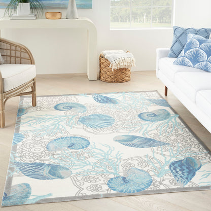 Tapis d'intérieur/extérieur Waverly Sun &amp; Shade Shore Thing Tropical Sea Shell Floral