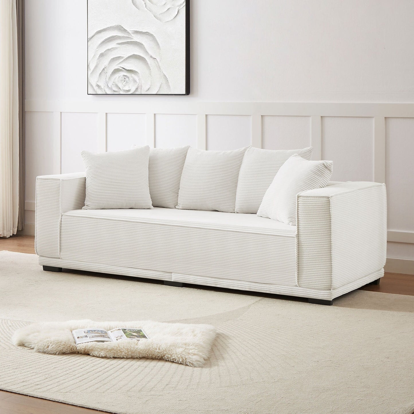 Canapé 3 places rembourré en velours côtelé blanc avec coussins décoratifs